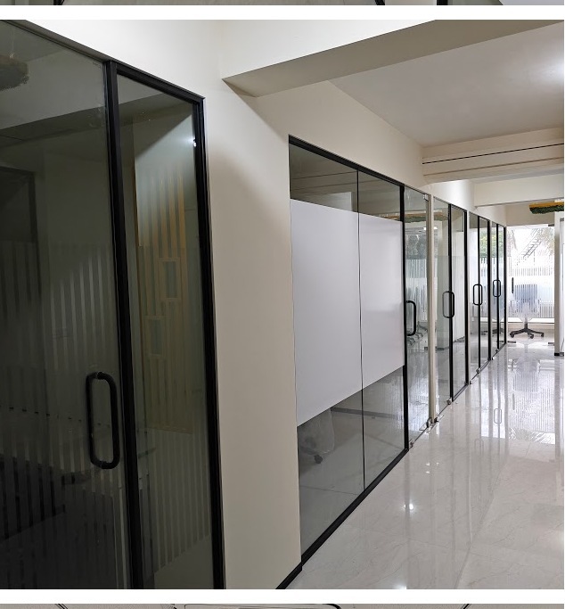 Hallway view of glass cabins at 43 Workspace