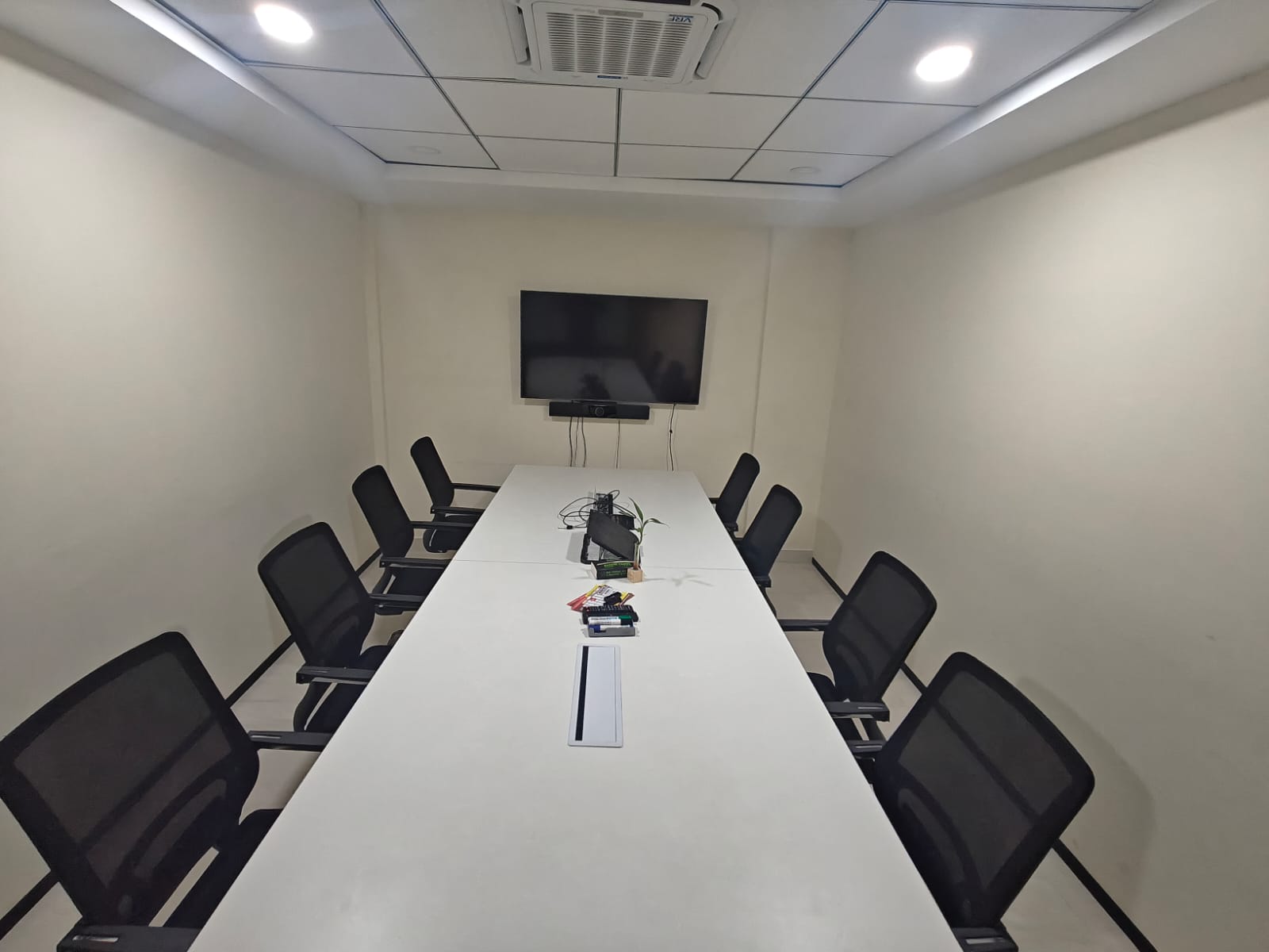 Conference room with video conferencing setup at 43 Workspace